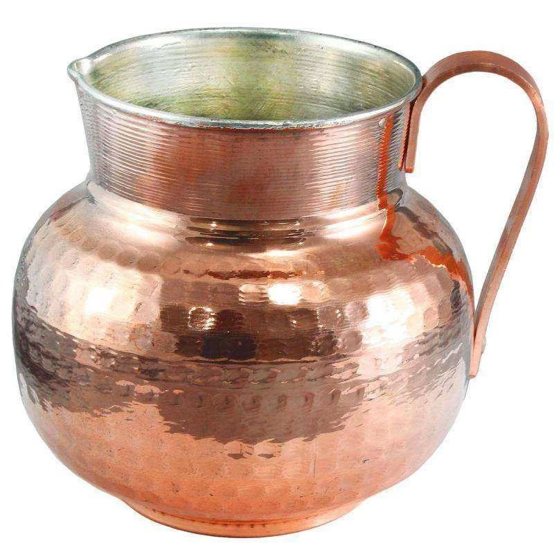 Description: The copper pitcher, with dimensions of 16×16×18 cm and a lightweight design of 450 grams, is a blend of beauty and functionality. Its elegant appearance makes it an eye-catching piece, whether used on a dining table or as a decorative item. Beyond its aesthetic charm, this pitcher offers various health benefits, thanks to the natural properties of copper. Known for its antioxidant and anti-cancer qualities, copper can contribute to overall well-being. Pair it with a copper cup for drinking water, as it is said to boost health and even assist in weight loss. A timeless addition to any home!